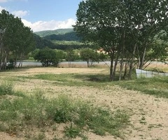 Vand 9500 mp teren intravilan constructii pe DN 7 Bujoreni - Gura Vaii